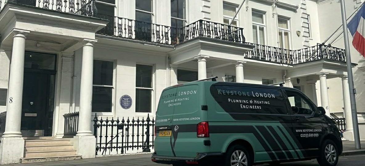 Company van parked on a residential street with the Keystone London Plumbing & Heating Engineers branding.